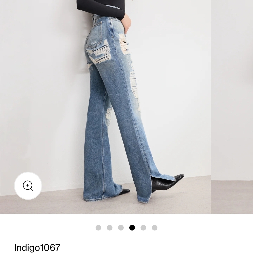 Good American Indigo Distressed Flare Jeans